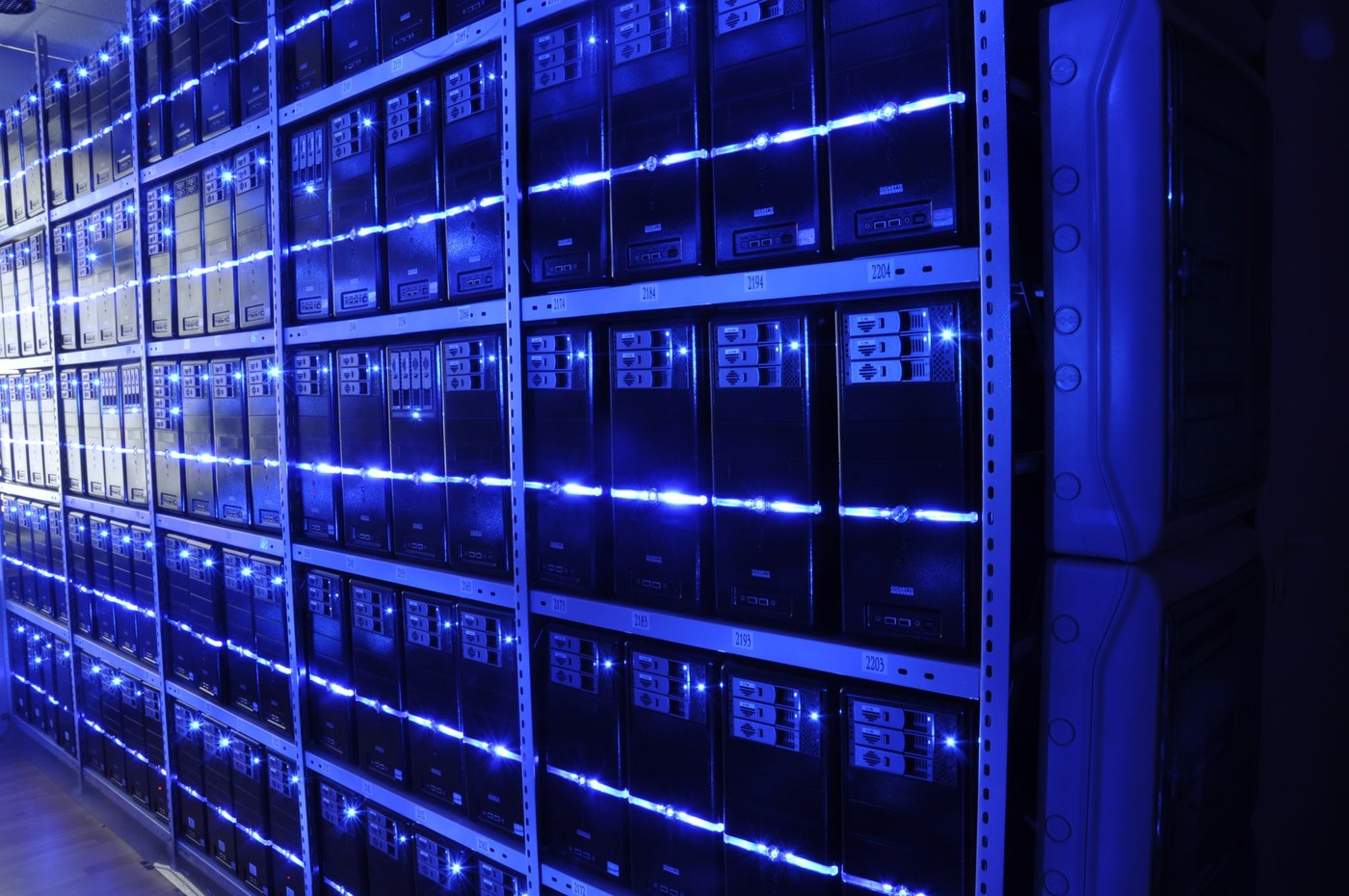 Rows of server racks in a data centre hall
