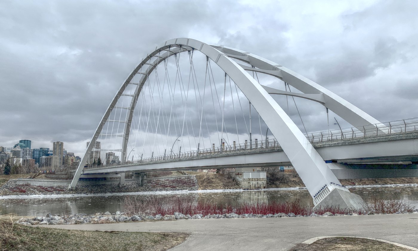 The Walterdale Bridge over the North Saskatchewan River with the Edmonton skyline behind it