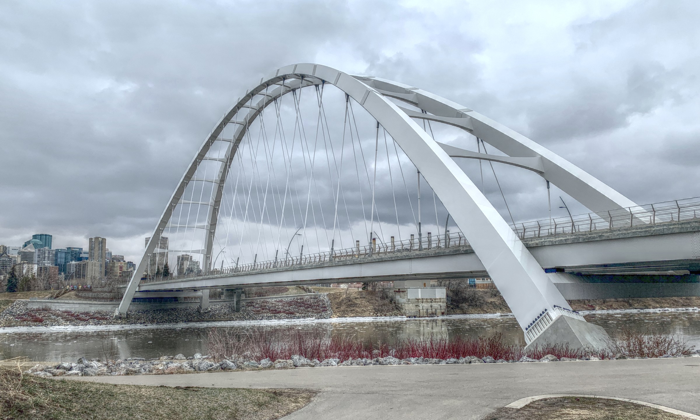 The Walterdale Bridge over the North Saskatchewan River with the Edmonton skyline behind it