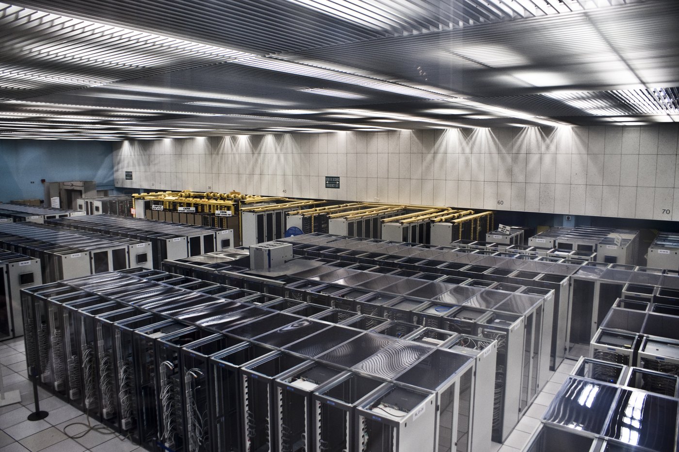 Racks of servers in a high performance computing hall